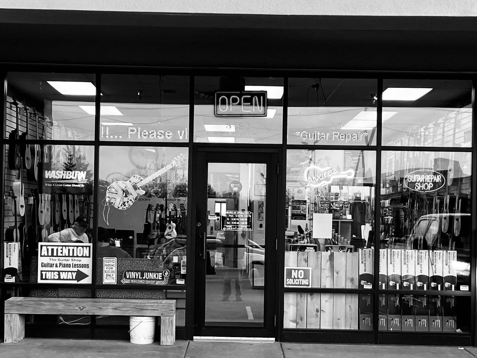 The Guitar Shop storefront and window display in Rosemount Market Square